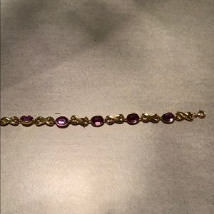 Gold & amethyst costume bracelet 7in long.